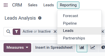 Open the CRM app and click on the Reporting tab at the top of the page, then click Leads.